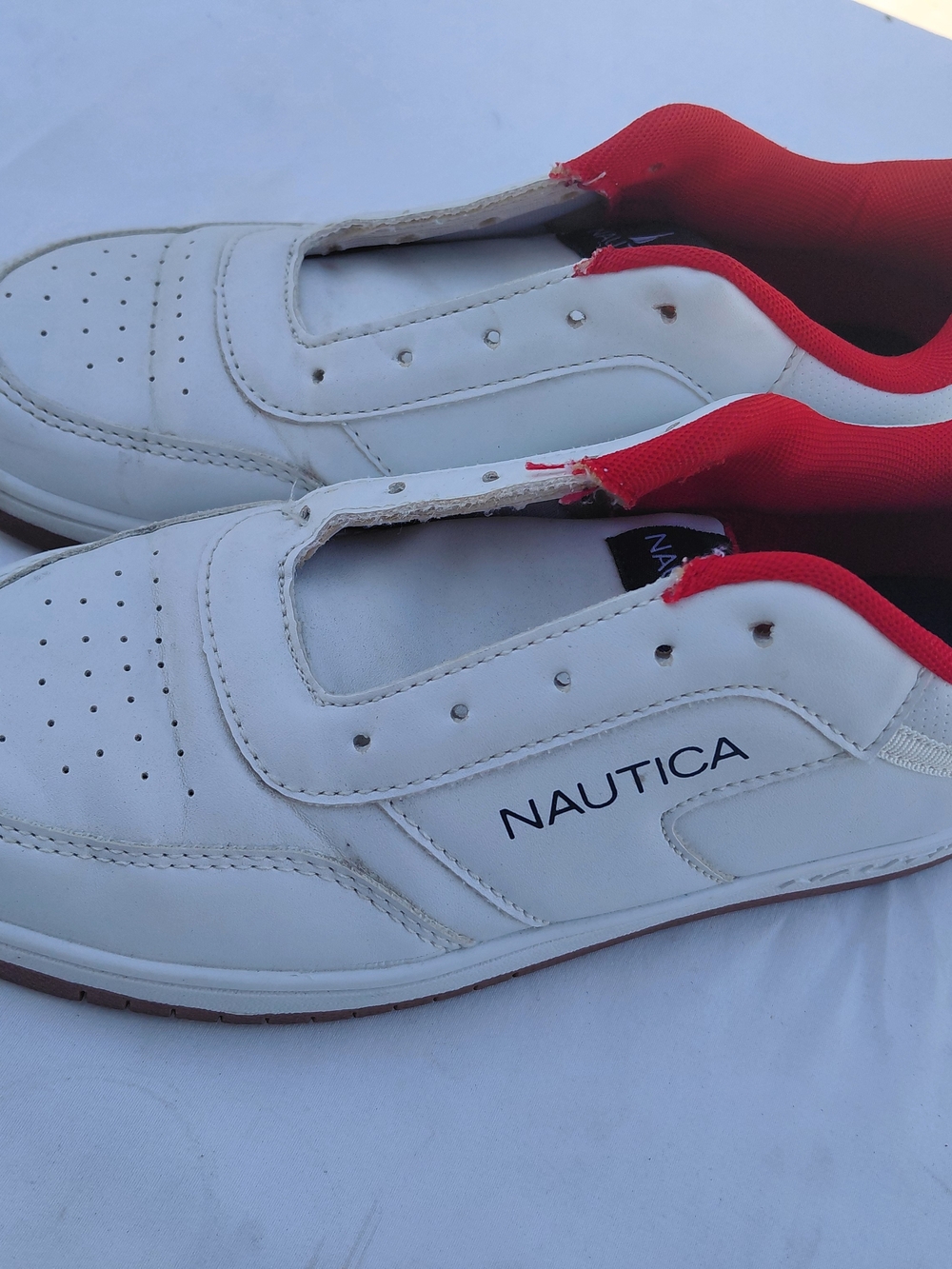 Nautica Men’s White and Red Slip-On Sneakers